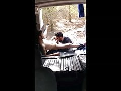 Horny couple having sex in van