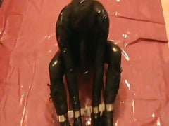 Rigidcuffed rubberslave - 1