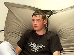 Adorable British newbie Shaun oils up his cock for solo play