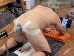 Mature beefcake ravages himself in the butt with fuck stick on a machine