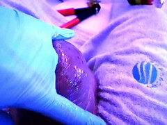 fingering the silicone cock with oil