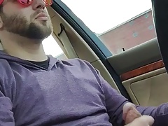 Cute guy jerking off while driving...