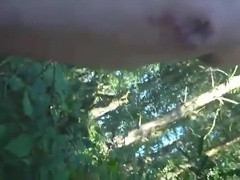 Sniffing navy socks while cruising in the forest