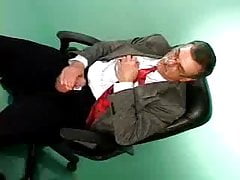 Mustached daddy in suit jerking off