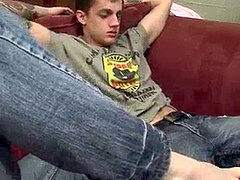 tatted youngster gets a footjob before getting to blow weenie