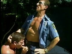 Pumped dudes play with their cocks outdoors