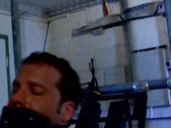 Hunky man Derek Pain is restrained to be tormented on his nipples