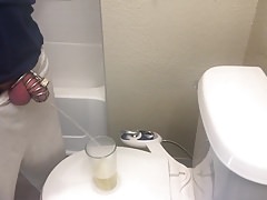 Chastity sub drinks his morning piss