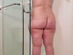Chubby MILF takes a hot shower after work