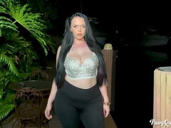 Big-boobed hottie Ryan Smiles poses topless in black tights