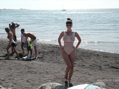 Naughty Russian MILF in Spain at the beach in see thru swimsuit - After beach - Public