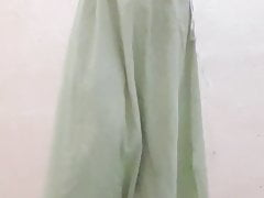 Crossdresser in blouse and peticoat with panty