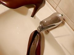 Piss in red stiletto high heel