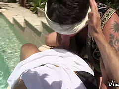 Costumed latino men plumbing outdoors passionately