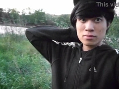 Jon Arteen in brief cutoffs ambles on grass bootless, displays his fellow feet, grins for you