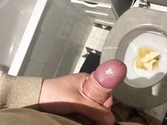 An 18-year-old masturbates in his toilet while he prepares food.