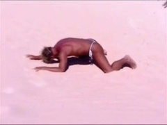 Tanned guy on beach in tiny string thong (temporarily!) 12