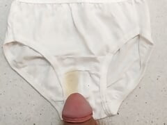 Rubbing myself on cute white panties then peeing on them a little