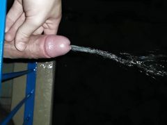 Peeing from the balcony while it rains. Dick german dick pissing outdoor.