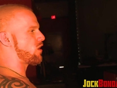 Luke Riley gets a flaming singletail closer to the nude flesh and rump of Drake Jaden