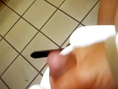 HANDSOME YOUNG HUNK IN PUBLIC RESTROOM STROKES COCK UNTIL HE EXPLODES ALL OVER HIMSELF AND THE WALL