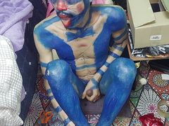 Masturbating in a Painted Suit