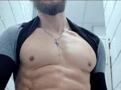 Shaved bearded father milks his sausage