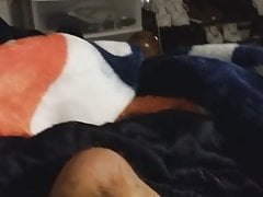 Masturbating