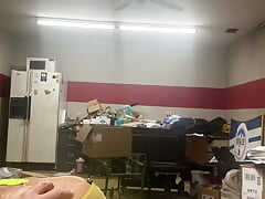 Voyeur view of big dick crossdressing bear cumming at work.