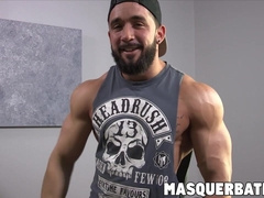 Muscular hunk with beard solo masturbating inside the gym
