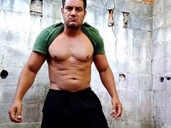 Muscular amateur star Yuri Gaucho showcases his hefty uncut cock for a steamy handjob