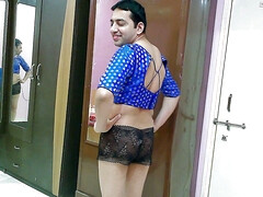 Sweet sissy crossdresser femboy Sweet Lollipop in a top and shorts.