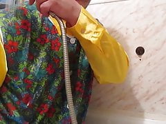 Showering in a satin blouse and dederon apron.