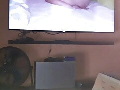 Handjob watching porn