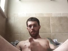 hot tatted man plays with is ass and pumps out a load