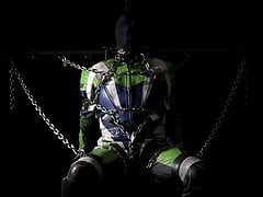 Leather biker tied to chair