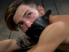 Bondage in leather straps for Casey Everett and Hunter Samson