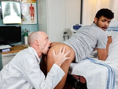 Curly young man tries his doctor's huge dick in a kinky gay play