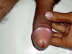 Closeup nude toilet masturbation.