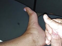 Jerking off on the couch while showing off my soles
