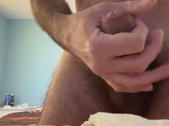 Earl Smile plays with his huge cock using a USB strap