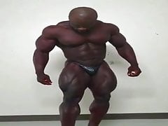 Huge bodybuilder flexing