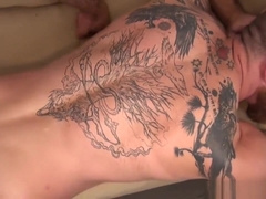 Tattooed ginger cums after bareback analsex