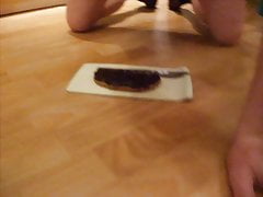 Breakfast like a real slave:Slave Joe eating from the bottom