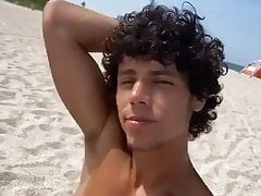 handsome naked guy at the beach