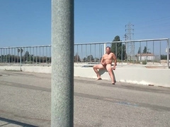 Naked getting off at a coastal basin with weather blazin'!