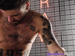 Tattoed men enjoy hardcore bareback