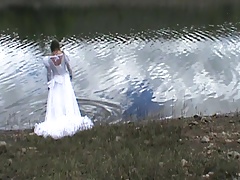 big wedding gown in a lake