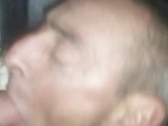Fag sucking cock at a gloryhole
