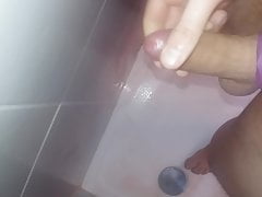 Shower cumshot in cockring